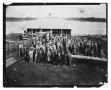 Photograph: [Photograph of Men at Event on Riverbank]