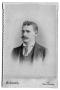 Photograph: [Man in suit with moustache]