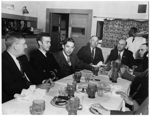 Primary view of object titled 'Group of Men at Dinner'.