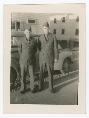 Primary view of object titled '[Two Soldiers Standing by a Car]'.