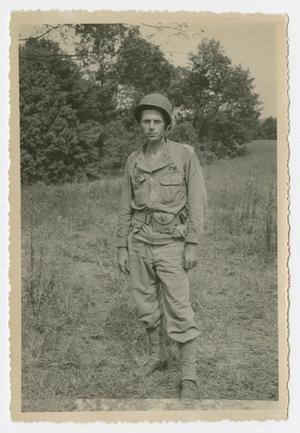 Primary view of object titled '[Photograph of William Cure in Training Field]'.