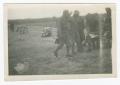Photograph: [Soldiers Among Outdoor Benches]