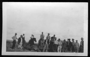 Primary view of object titled '[Group of men in front of tractor on Frank Butler Farm ]'.