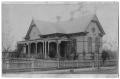 Thumbnail image of item number 1 in: '[Two Story House with Front Porch]'.