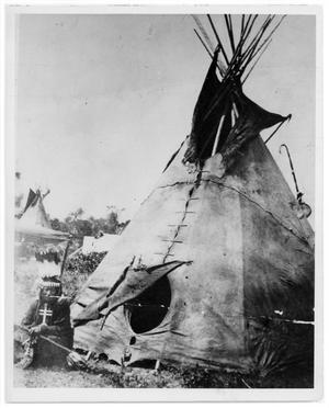 Primary view of object titled '[Portrait of Indian Scout and Teepee]'.