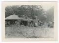 Photograph: [Tents and Vehicles]