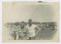 Photograph: [Three Soldiers in a Field at Camp Campbell]