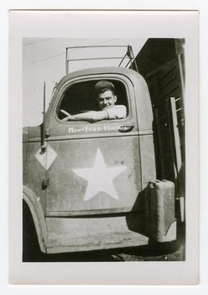 Primary view of object titled '[Elmer Heinlein in a Water Truck]'.