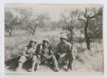 Thumbnail image of item number 1 in: '[Three Soldiers Sitting in a Lightly Wooded Field]'.