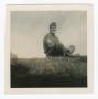 Photograph: [Sergeant Charles O'Rourke Sitting on Grass]