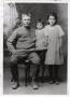 Photograph: [Jesus Cabezuela and his two daughters in a family portrait]
