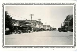 Primary view of object titled '[Downtown Georgetown with Model-T cars]'.