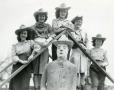 Photograph: [Photograph of Cowgirl Band with HSU Cowboy Statue]
