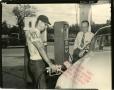 Photograph: [Photograph of Pumping Gas]