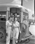Photograph: [Four Women Exiting a Bus]