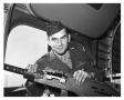 Photograph: [Sergeant Hayduk Posing with Waist Gun]
