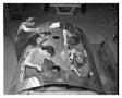 Photograph: [Four Women Working on the Canopy Section of an Aircraft]
