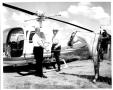 Photograph: W.G. Swenson Getting into a Helicopter