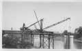 Photograph: [The initial construction of the Brazos River Bridge.]
