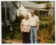 Photograph: [Agnes Harrelson and Edward Wells in a Yard]