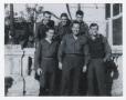 Photograph: [Alex Bratman Standing with Five Other Soldiers]