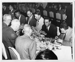 Primary view of object titled 'Men in Suits at Banquet'.