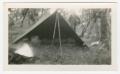 Photograph: [Soldier Behind a Tent]