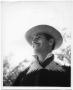 Photograph: Man in a Hat and Poncho