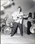 Photograph: [Elvis Presley performing with the Blue Moon Boys]