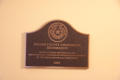 Photograph: [Photograph of Plaque in Courthouse]