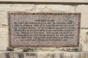 Primary view of object titled '[Pink Granite Plaque on Courthouse]'.