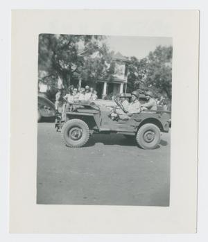 Primary view of object titled '[Soldiers in a Jeep]'.