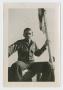 Photograph: [Soldier with Flag]