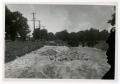 Primary view of [Photograph of Dirt Road Under a Bridge]