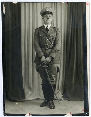 Primary view of object titled 'Portrait of Cadet In Uniform with Sword'.