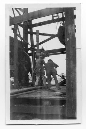 Primary view of object titled 'Gulf Oil Men Working on Pipeline'.