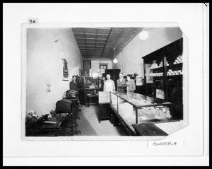 Primary view of object titled 'Interior View of Store Front, Cox Typewriter Exchange and Staff'.