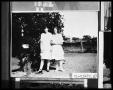 Photograph: Two Girls in Yard
