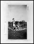 Photograph: Man With Children In Yard #2