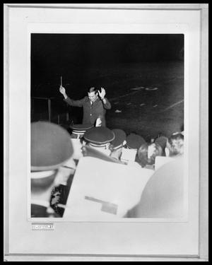 Primary view of object titled 'Man Conducting Band'.