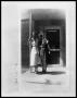 Photograph: Two Ladies Standing Outside