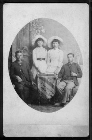 Primary view of object titled '[Two young women (in center) and two young men.]'.