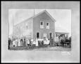 Photograph: People in Front of Steam Laundry and Wagon