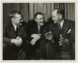 Photograph: [Photograph of Men on Couch]