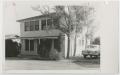 Photograph: [Photograph of Art Building with Car]