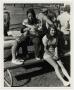 Primary view of [Photograph of Students on Picnic Table]
