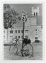 Primary view of [Photograph of Bicycle and Radford Auditorium]