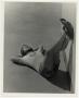 Photograph: [Photograph of Student Lying on Floor]