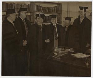 Primary view of object titled '[Photograph of Men at 1957 Commencement]'.