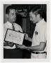 Primary view of [Photograph of Man Receiving Award]